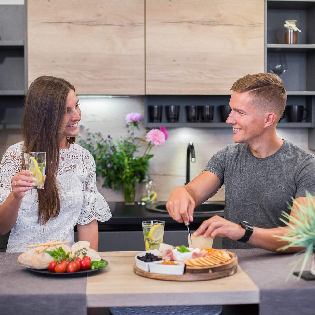 Charcuterie Board Set and Cheese Serving Platter - Made from Acacia Wood - US Patented 13 Inch Cheese Board and Knife Set for Entertaining and Serving - 4 Knives and 4 Bowls